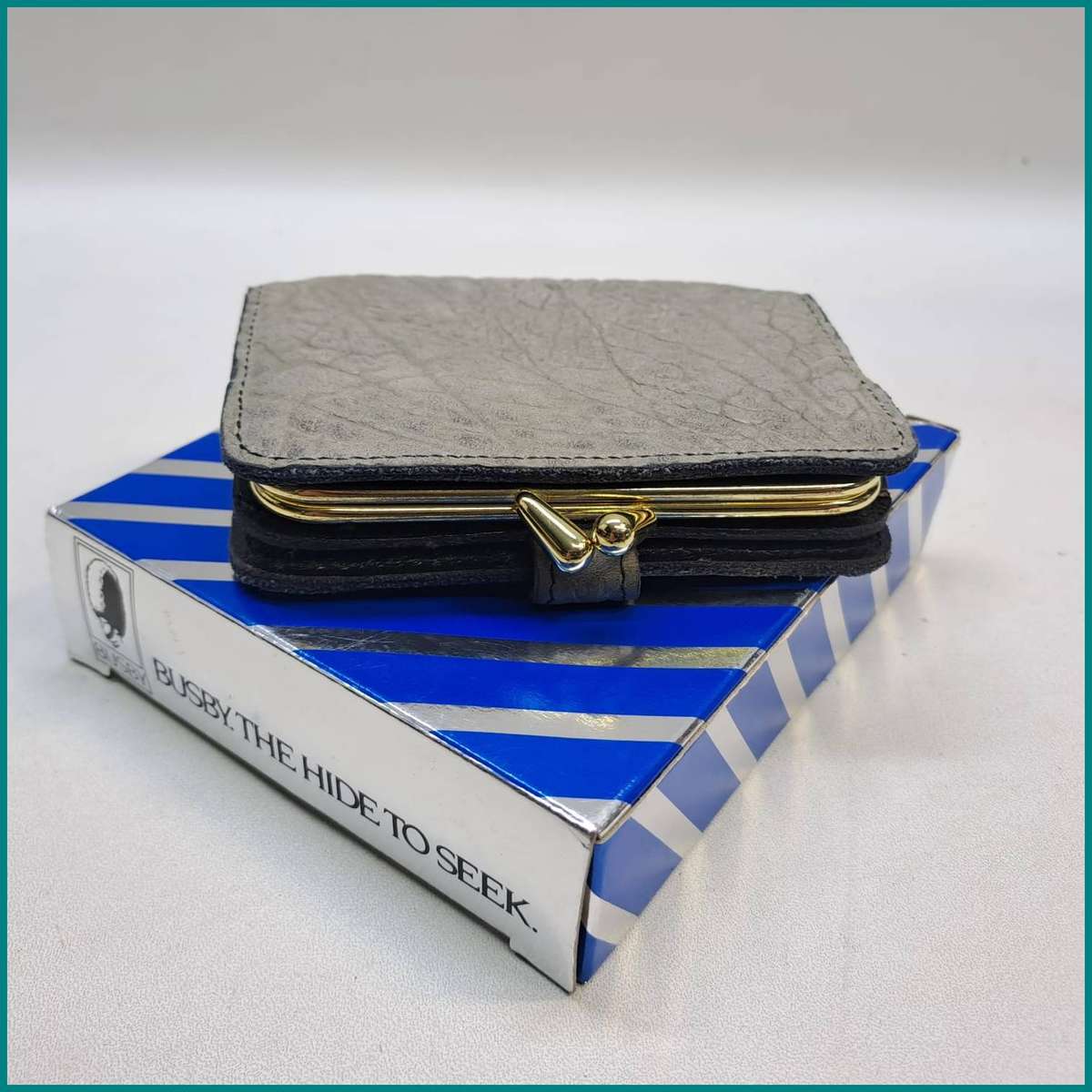Boxed Busby wallet is crafted from textured wild buffalo leather