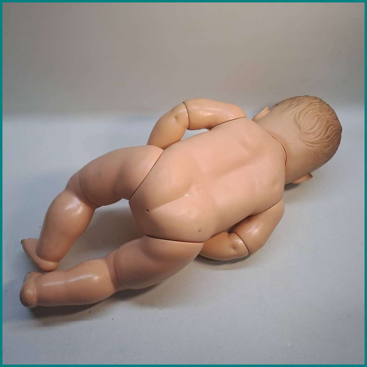 Vintage rubber or vinyl baby doll from the 1950s