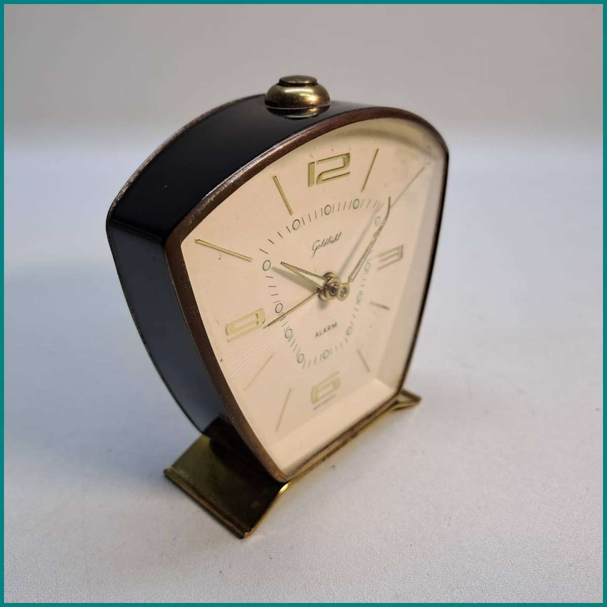 Working 1950s vintage Goldbühl alarm clock manufactured in West Germany