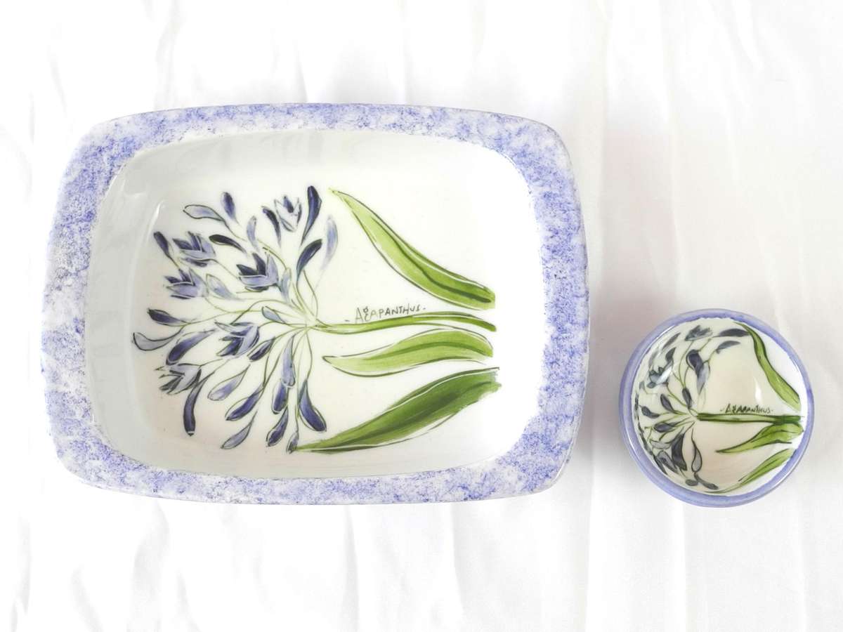 Hand painted ceramic dishes featuring the Agapanthus