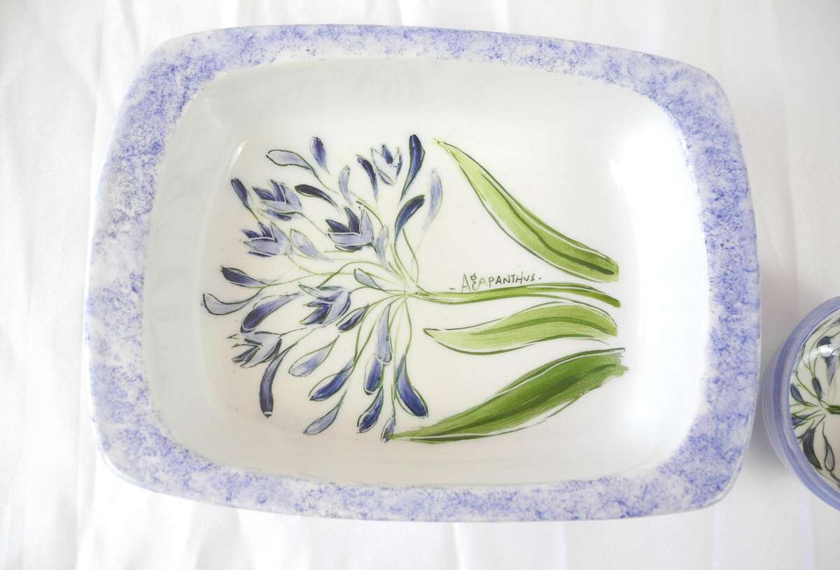 Hand painted ceramic dishes featuring the Agapanthus