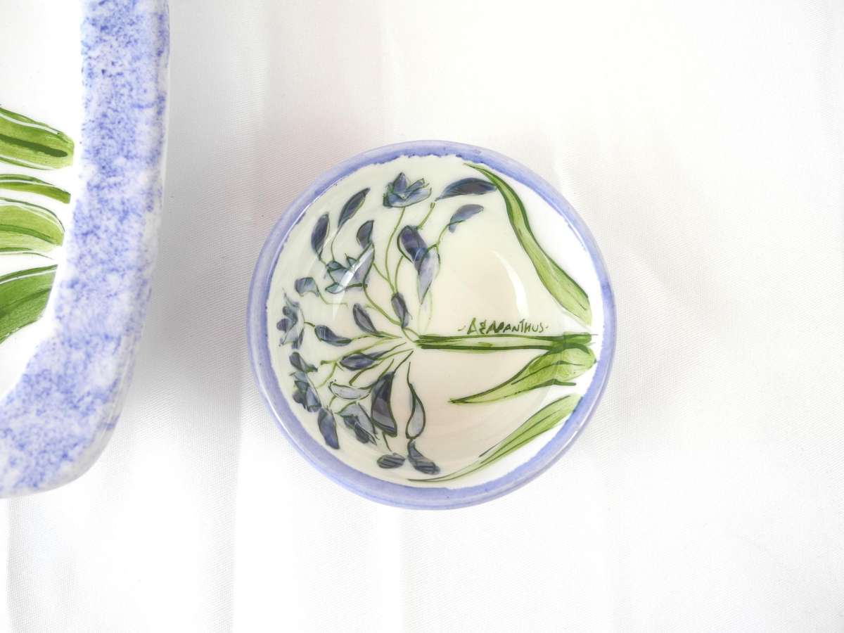 Hand painted ceramic dishes featuring the Agapanthus