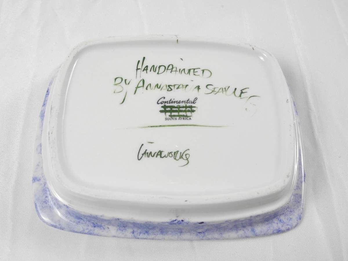 Hand painted ceramic dishes featuring the Agapanthus