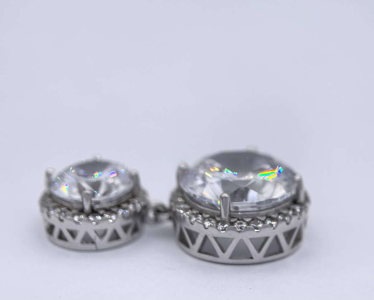 large double halo cubic drop pendant set in 925 sterling silver.