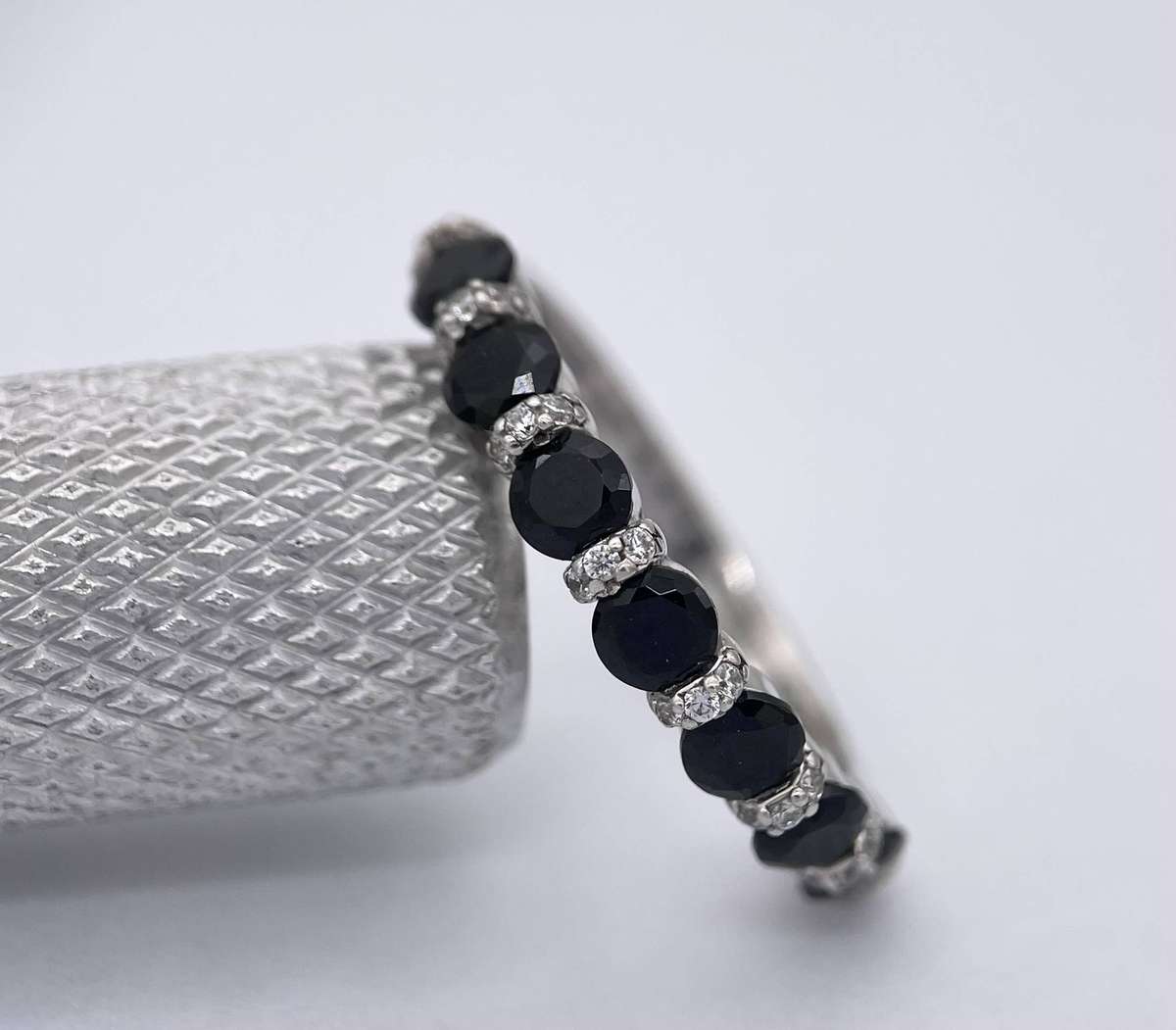 Black cubic half eternity band