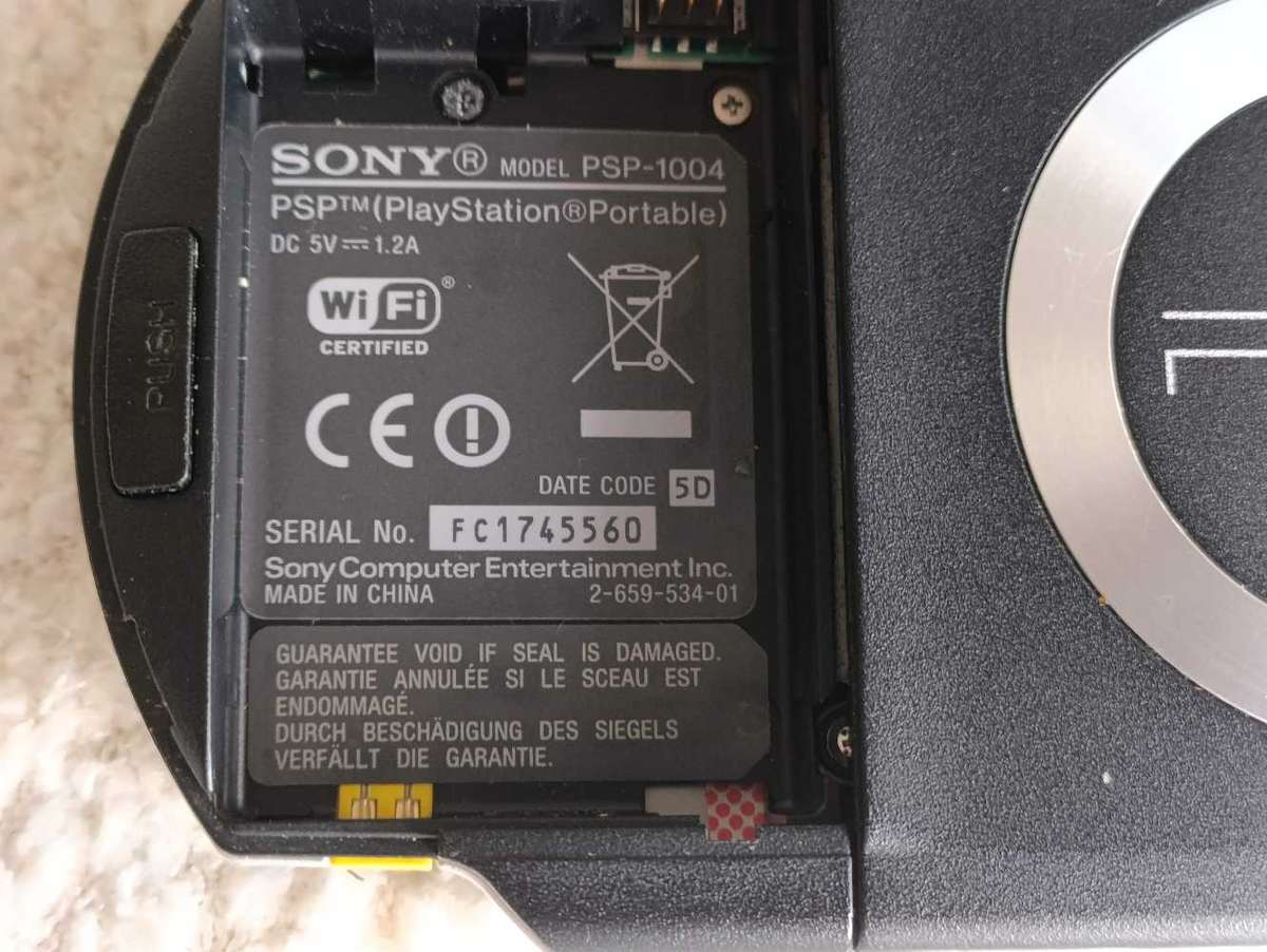 Sony Psp 1004 With Original Charger, Memory Card +Games