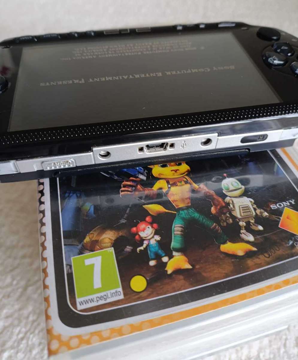 Sony Psp 1004 With Original Charger, Memory Card +Games