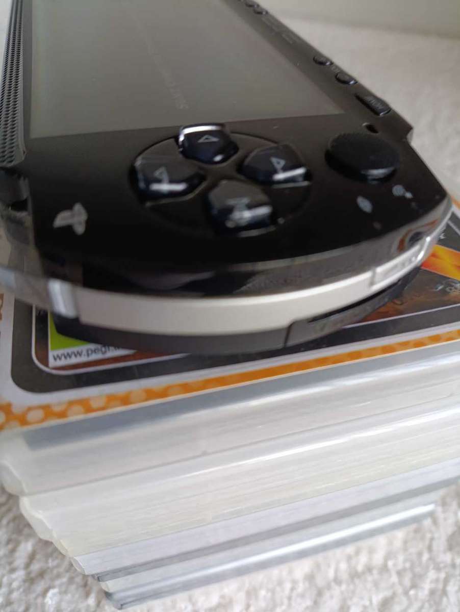 Sony Psp 1004 With Original Charger, Memory Card +Games