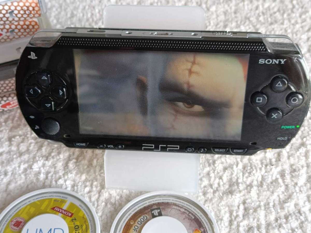 Sony Psp 1004 With Original Charger, Memory Card +Games