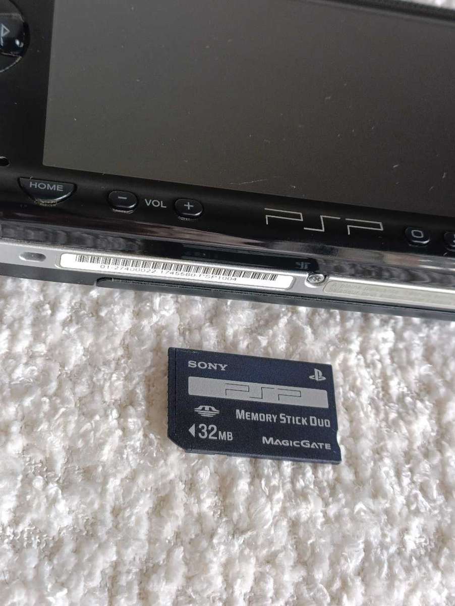 Sony Psp 1004 With Original Charger, Memory Card +Games