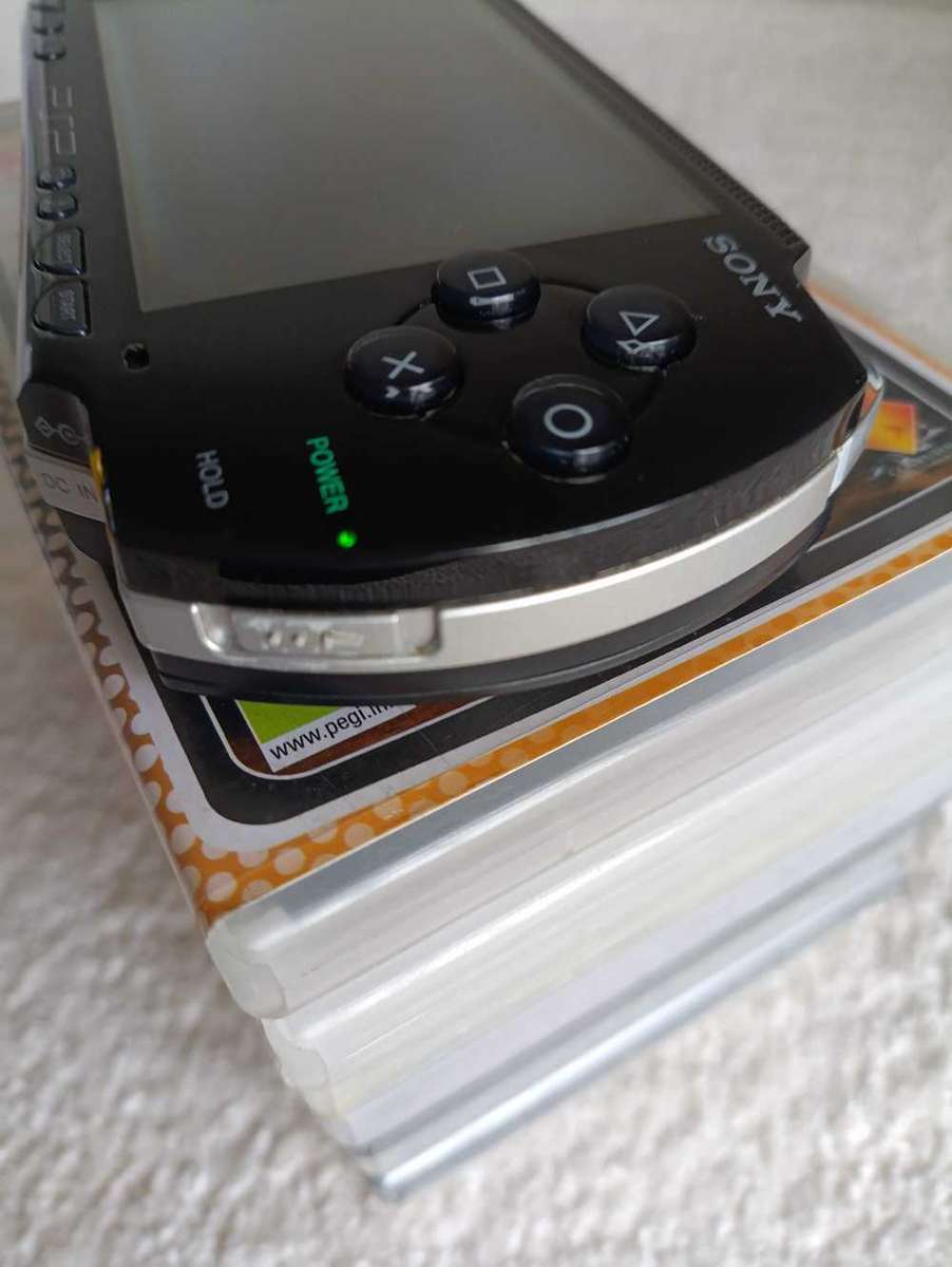 Sony Psp 1004 With Original Charger, Memory Card +Games
