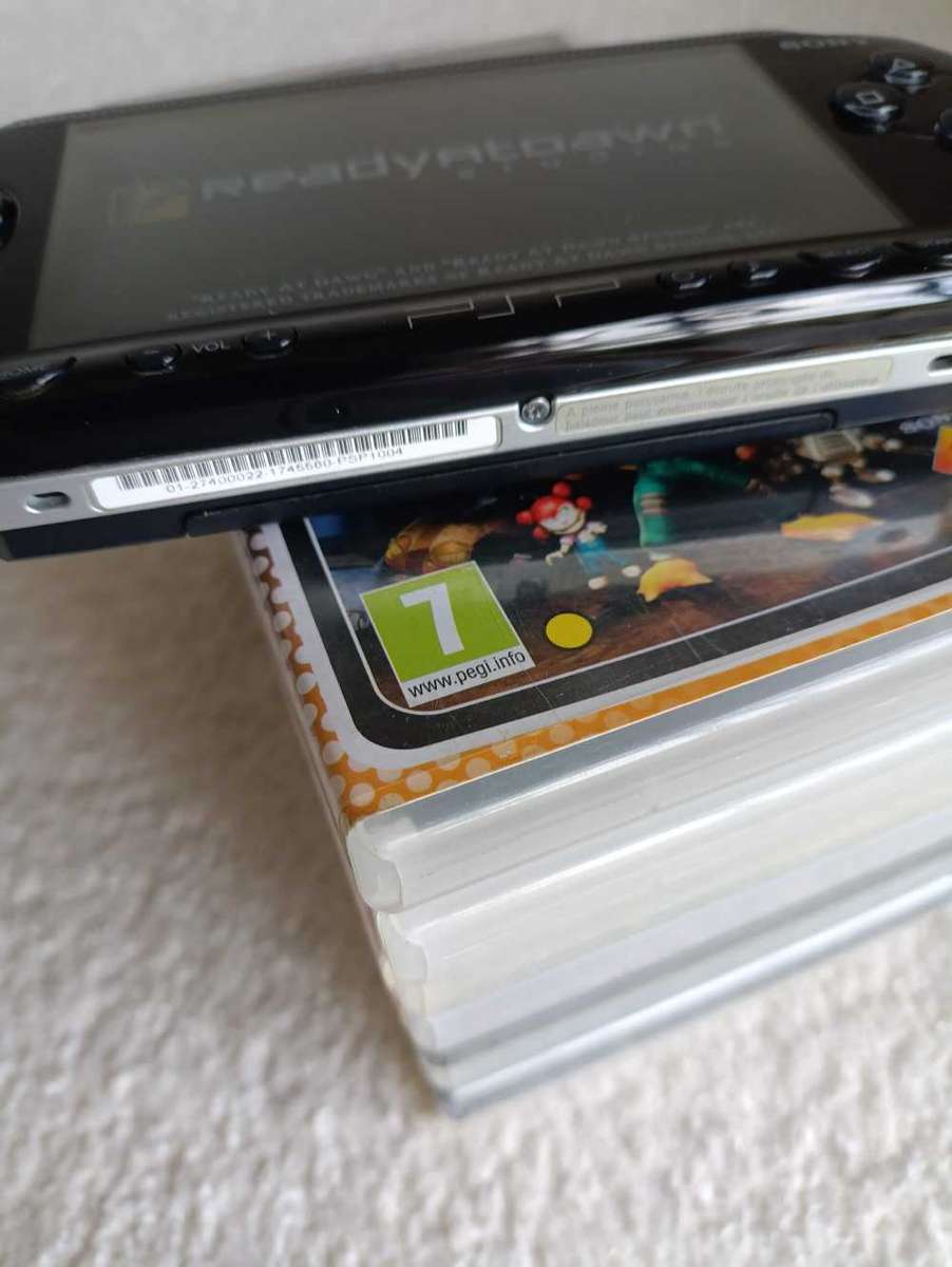 Sony Psp 1004 With Original Charger, Memory Card +Games