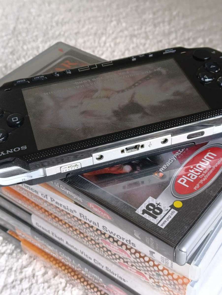 Sony Psp 1004 With Original Charger, Memory Card +Games