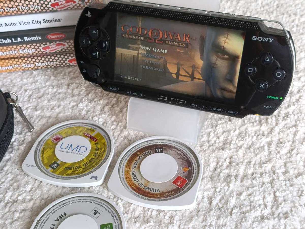 Sony Psp 1004 With Original Charger, Memory Card +Games