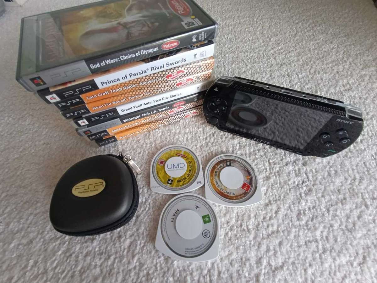 Sony Psp 1004 With Original Charger, Memory Card +Games