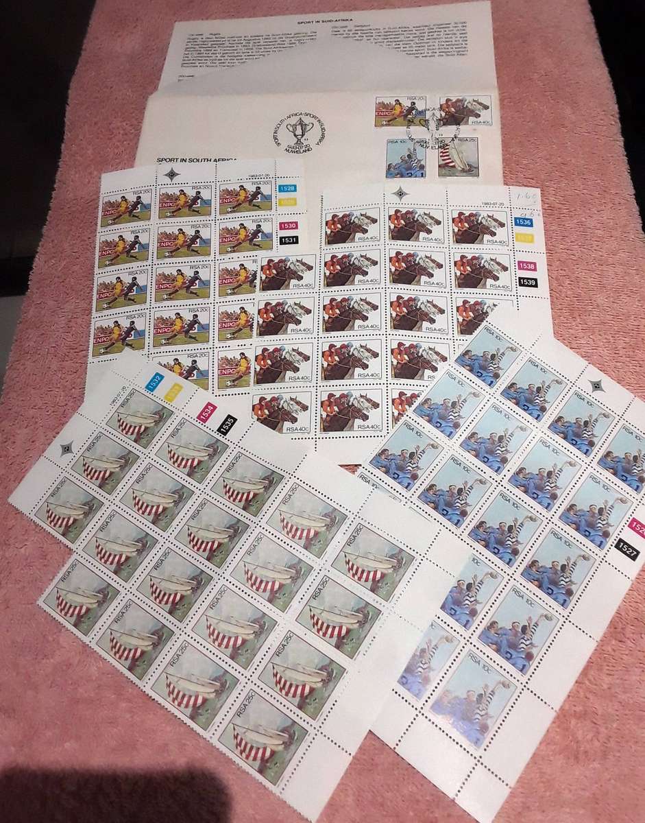 FDC's in Ring File with mint stamps and post cards.