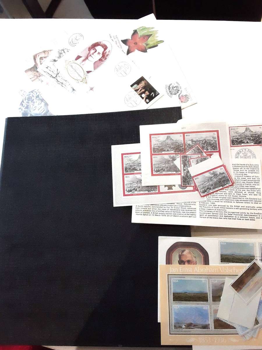 FDC's with mini sheets and stamps in ring file. Over 40. See photos