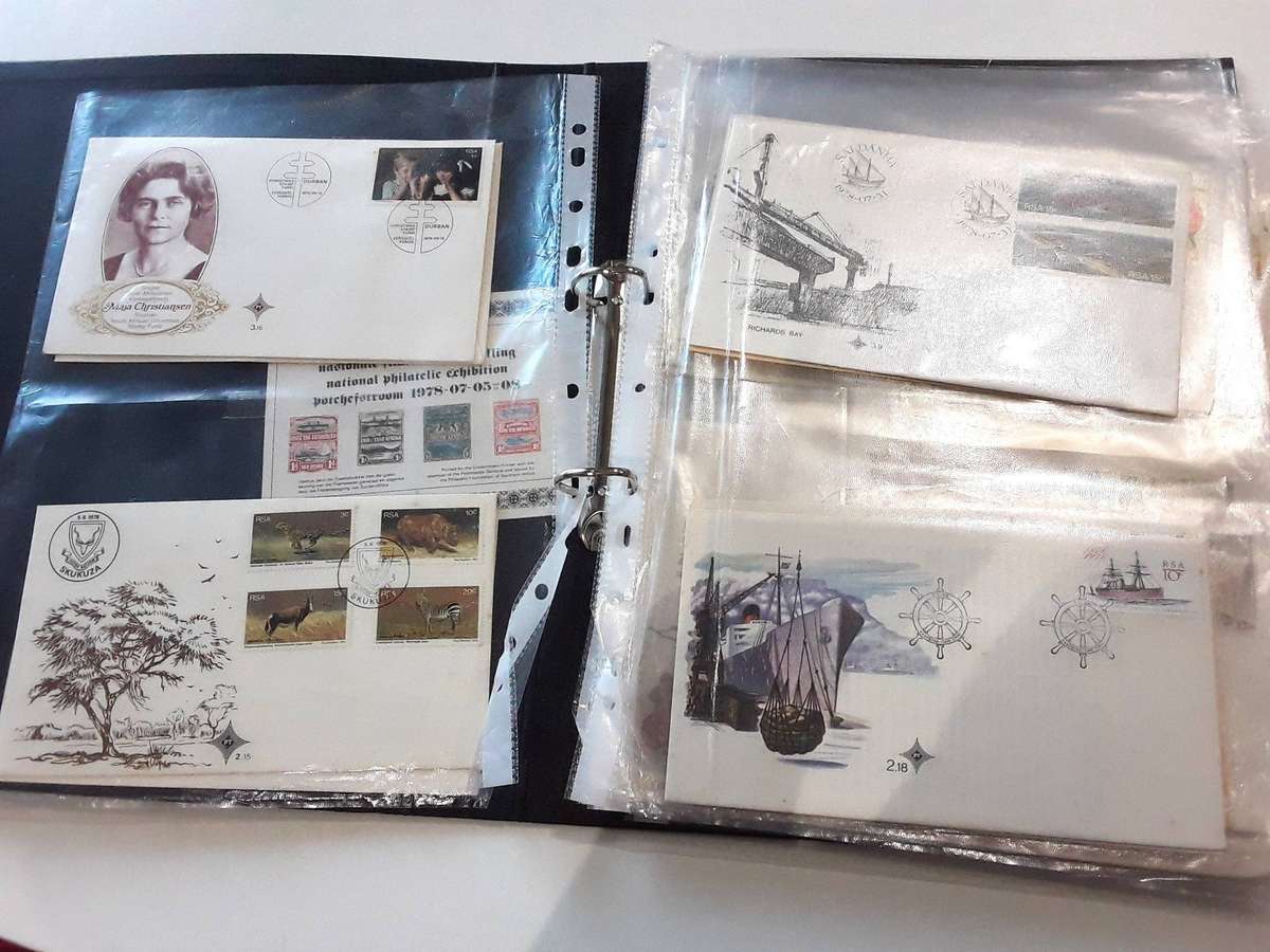 FDC's with mini sheets and stamps in ring file. Over 40. See photos