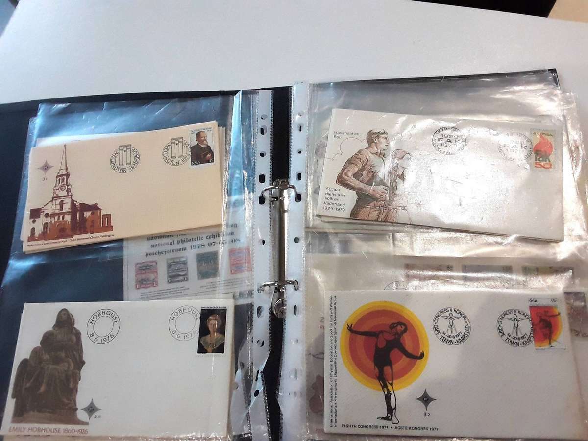 FDC's with mini sheets and stamps in ring file. Over 40. See photos