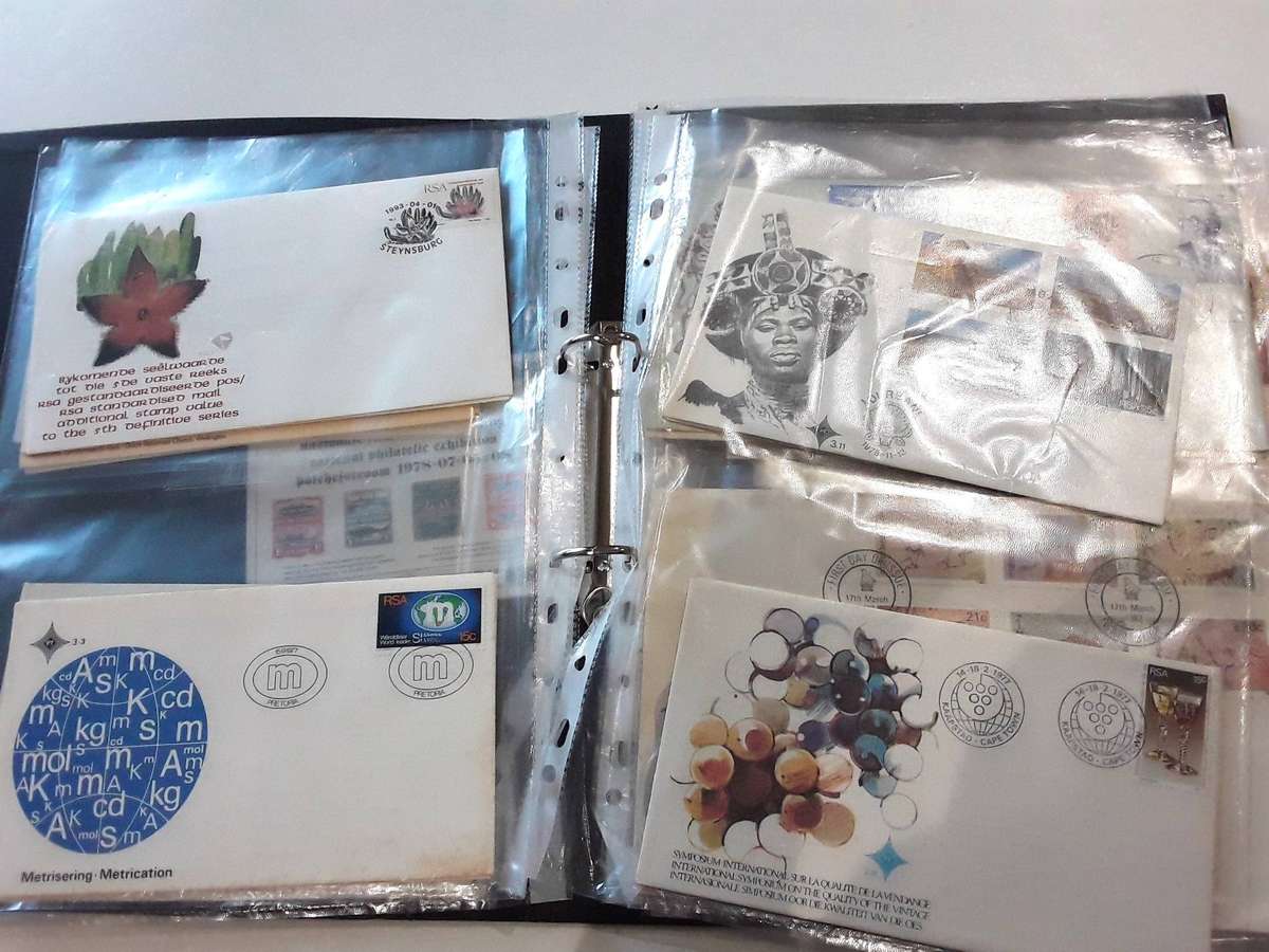 FDC's with mini sheets and stamps in ring file. Over 40. See photos
