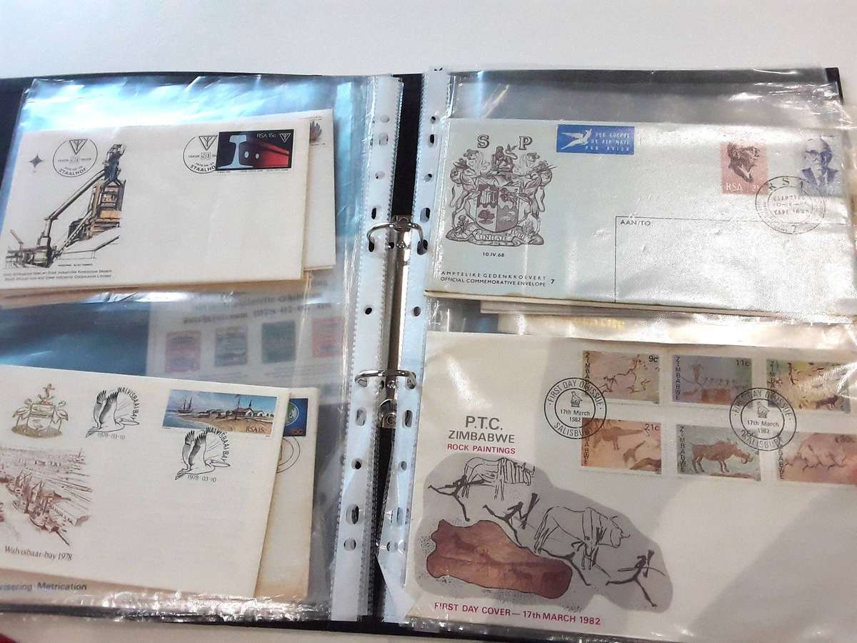 FDC's with mini sheets and stamps in ring file. Over 40. See photos