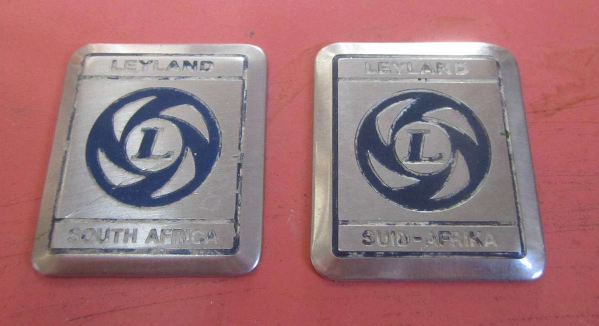 2 x Small Metal Leyland Badges - English & Afrikaans