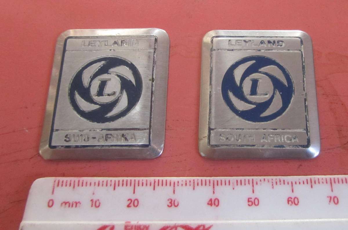 2 x Small Metal Leyland Badges - English & Afrikaans