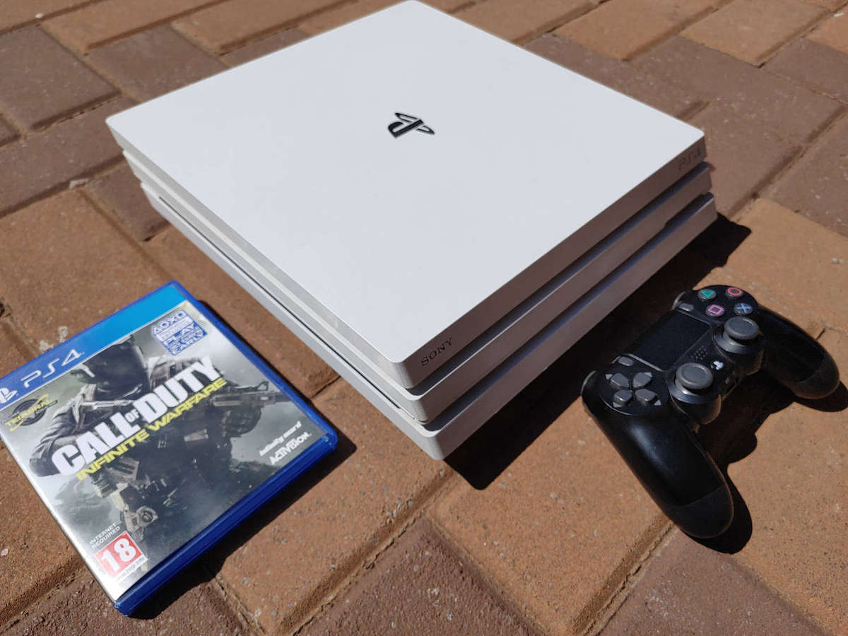 Rare White PS4 Pro Console with Controller and Game