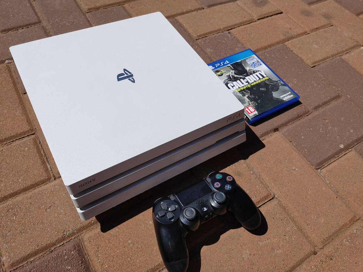 Rare White PS4 Pro Console with Controller and Game