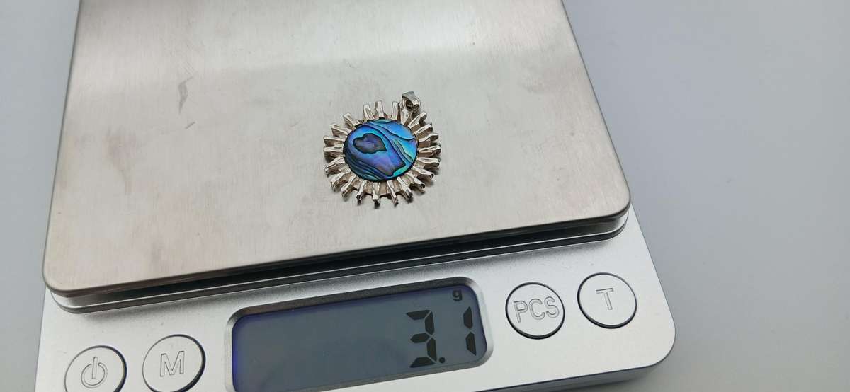 Sterling Silver Sun Pendant with Shell