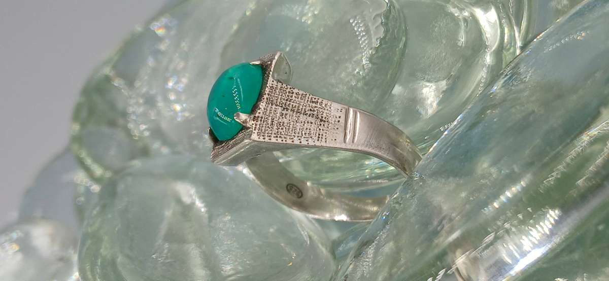 Vintage Sterling Silver Ring with Oval-Cut Green Stone