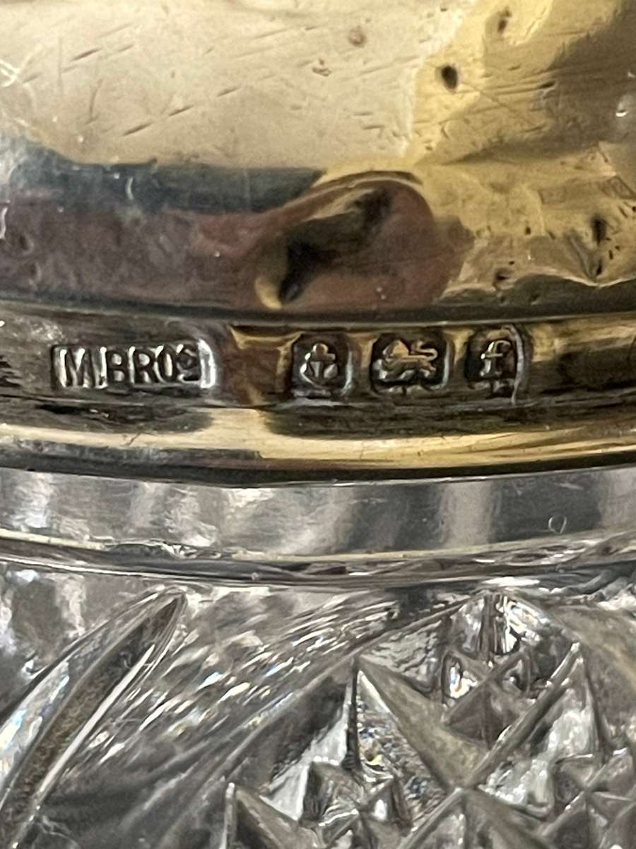 Sterling silver cut glass dressing table jar featuring cherub design