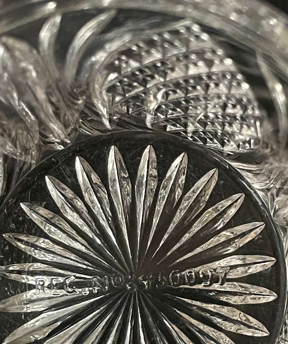 Sterling silver cut glass dressing table jar featuring cherub design