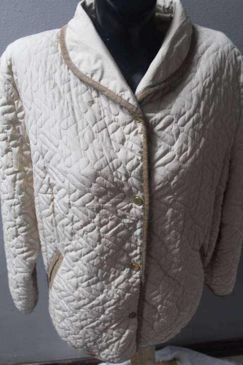 cream quilted jacket.