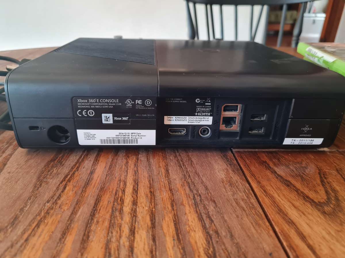 XBOX 360 E Console + Remotes + Games