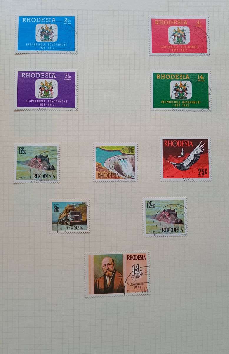 RHODESIA 21 PAGE ALBUM FROM 1952 & UP. NOT ALL PAGES SHOWN. LOVELY COLLECTION