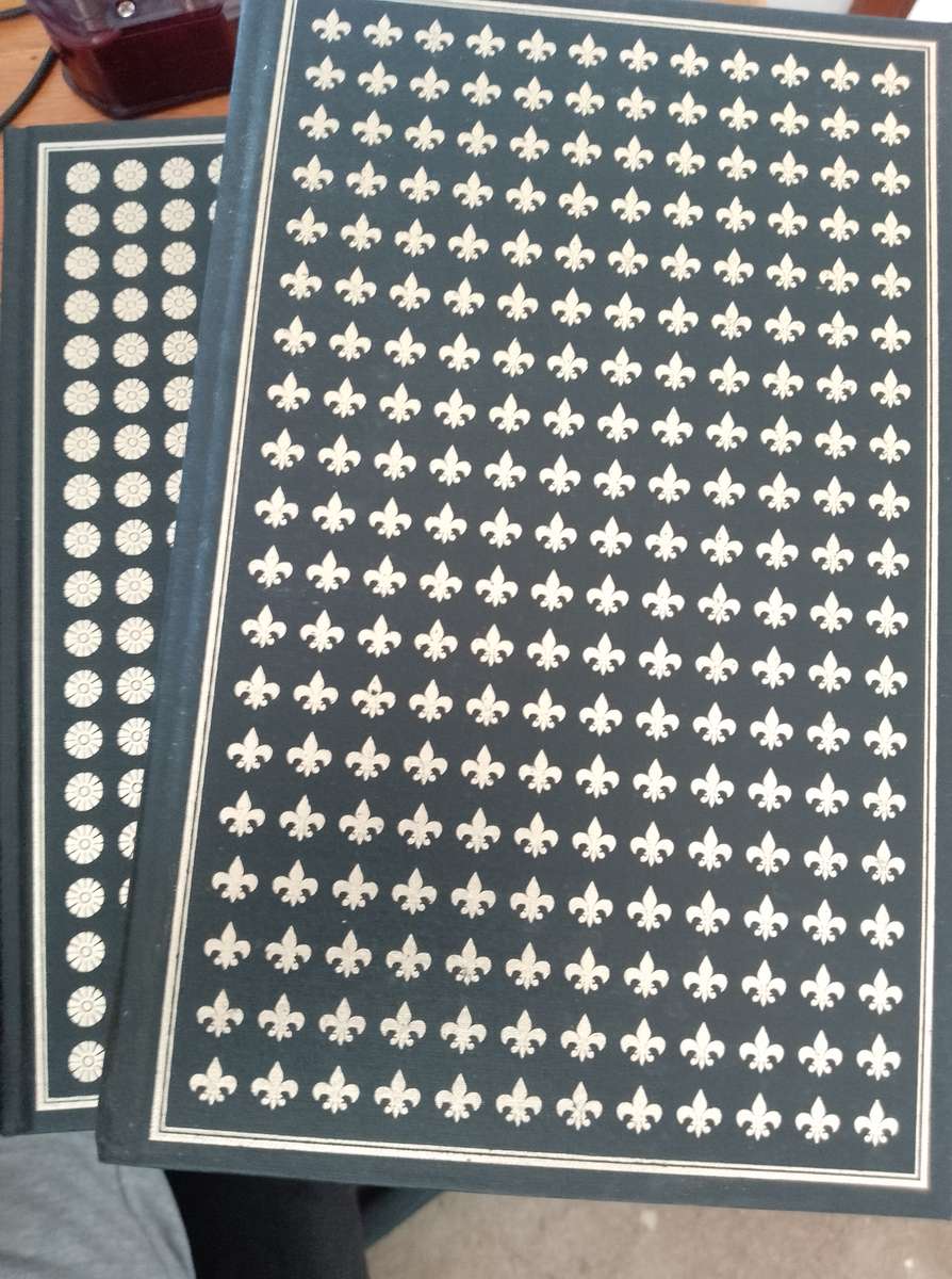 Barbara W Tuchman set of 4 books slip cover has wear and tear.