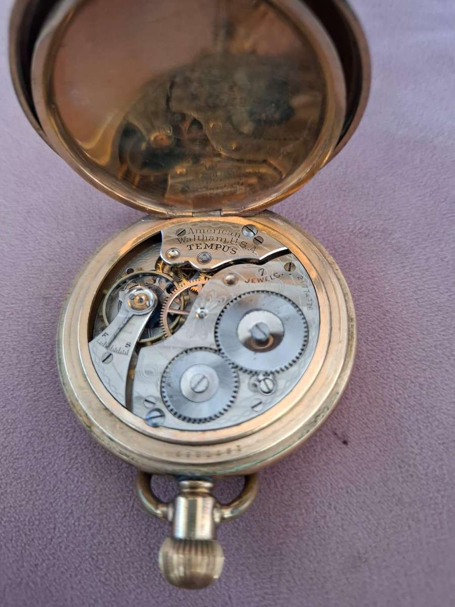 Waltham gold plated open face pocket watch, serial no 1977853, "The Russel model"