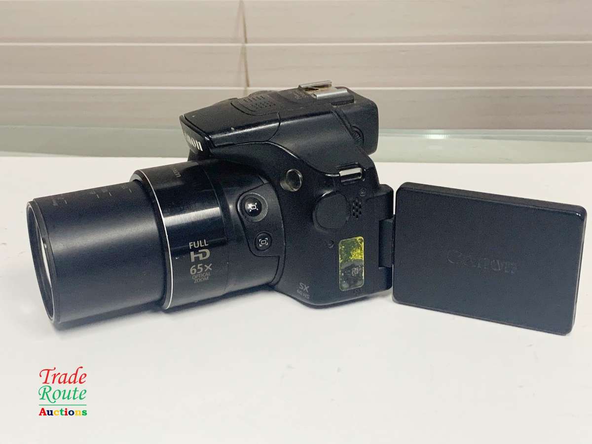 Canon Powershot SX60 HS 16.1MP Digital Camera 65x Optical Zoom Lens 3-inch LCD Tilt Screen (Black)