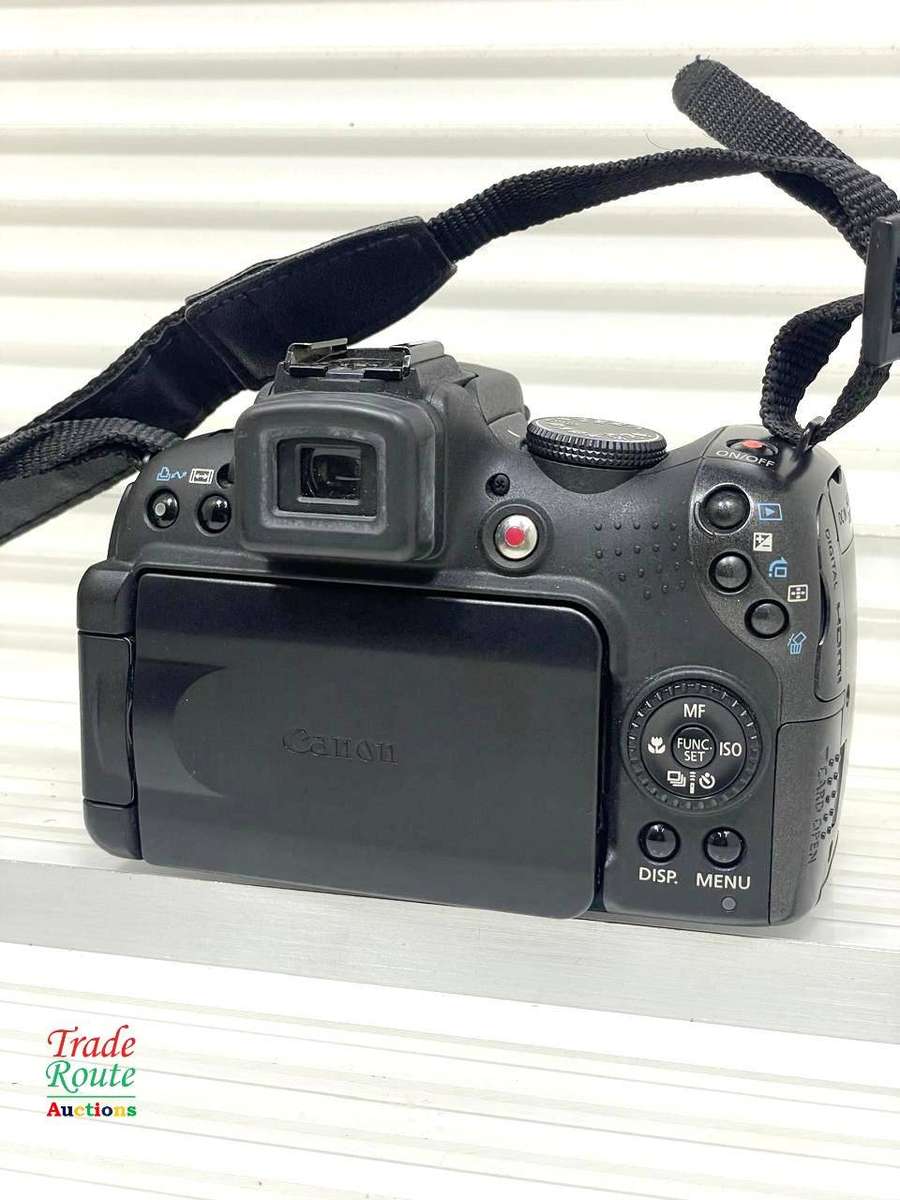 Canon PowerShot SX1 IS 10 MP Digital Camera 20x Wide Angle Optical Image Stabilized Zoom