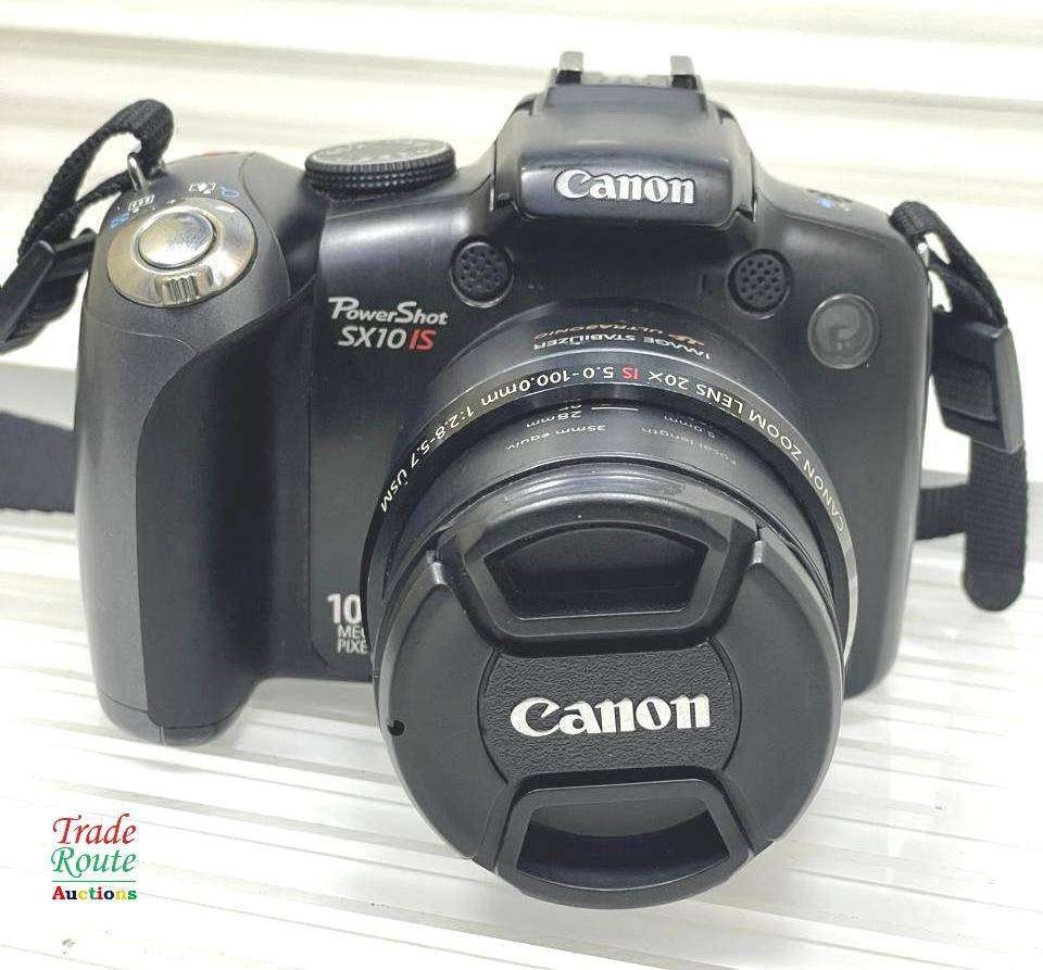 Canon PowerShot SX10 IS 10 MP Digital Camera 20x Wide Angle Optical Image Stabilized Zoom