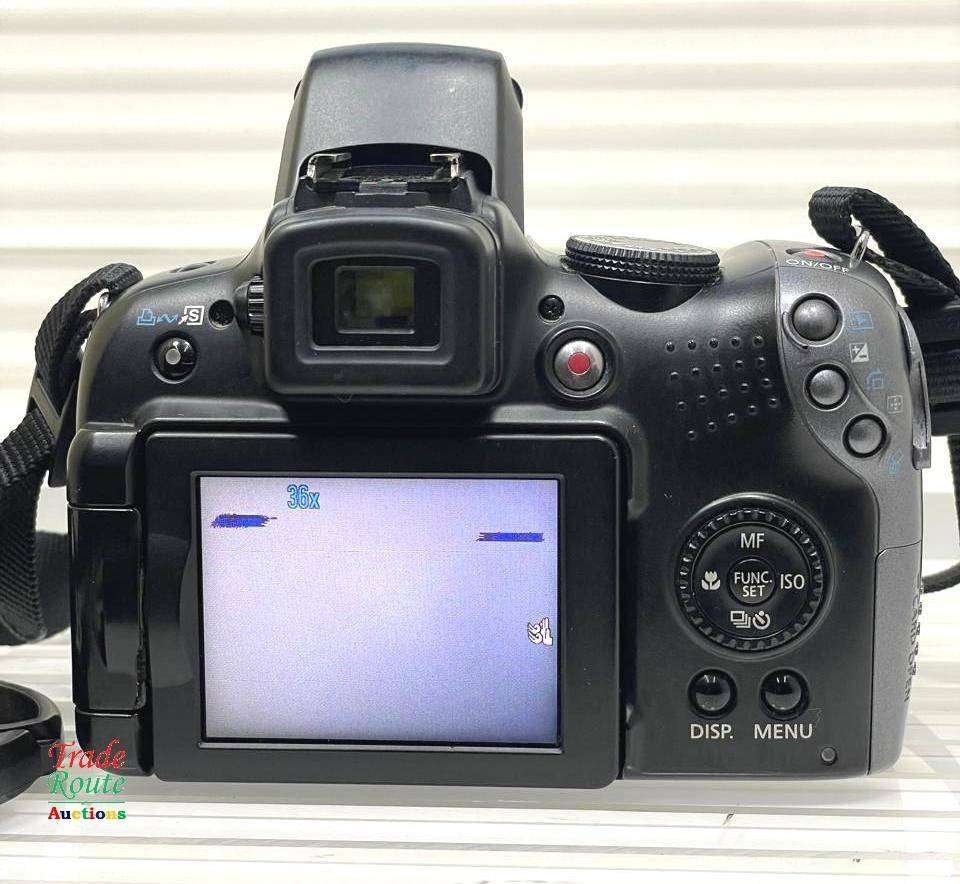 Canon PowerShot SX10 IS 10 MP Digital Camera 20x Wide Angle Optical Image Stabilized Zoom