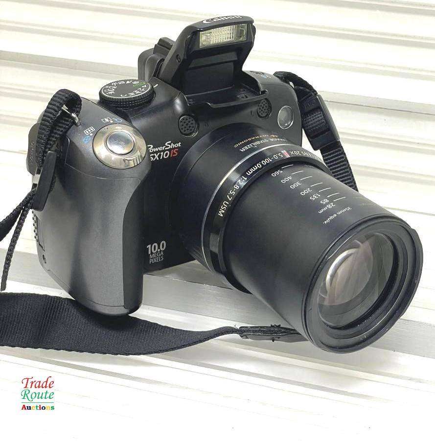 Canon PowerShot SX10 IS 10 MP Digital Camera 20x Wide Angle Optical Image Stabilized Zoom