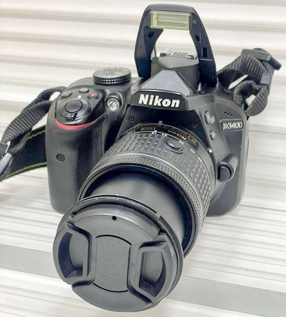 Nikon D3400 24.2 MP DSLR Camera body + Nikon AF-P 18-55 VR Lens Kit