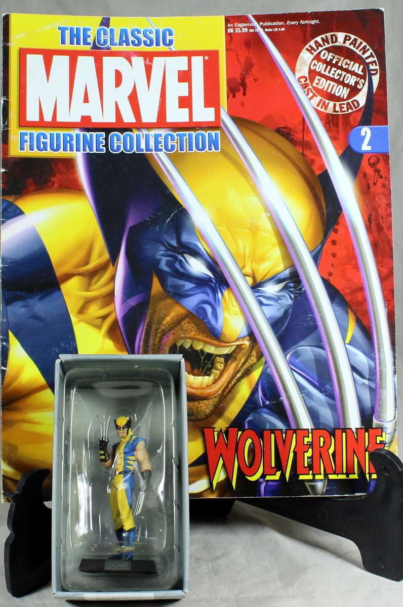 Marvel comics - lead, hand painted figurine with book - Wolverine #2