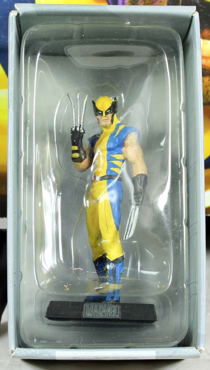 Marvel comics - lead, hand painted figurine with book - Wolverine #2
