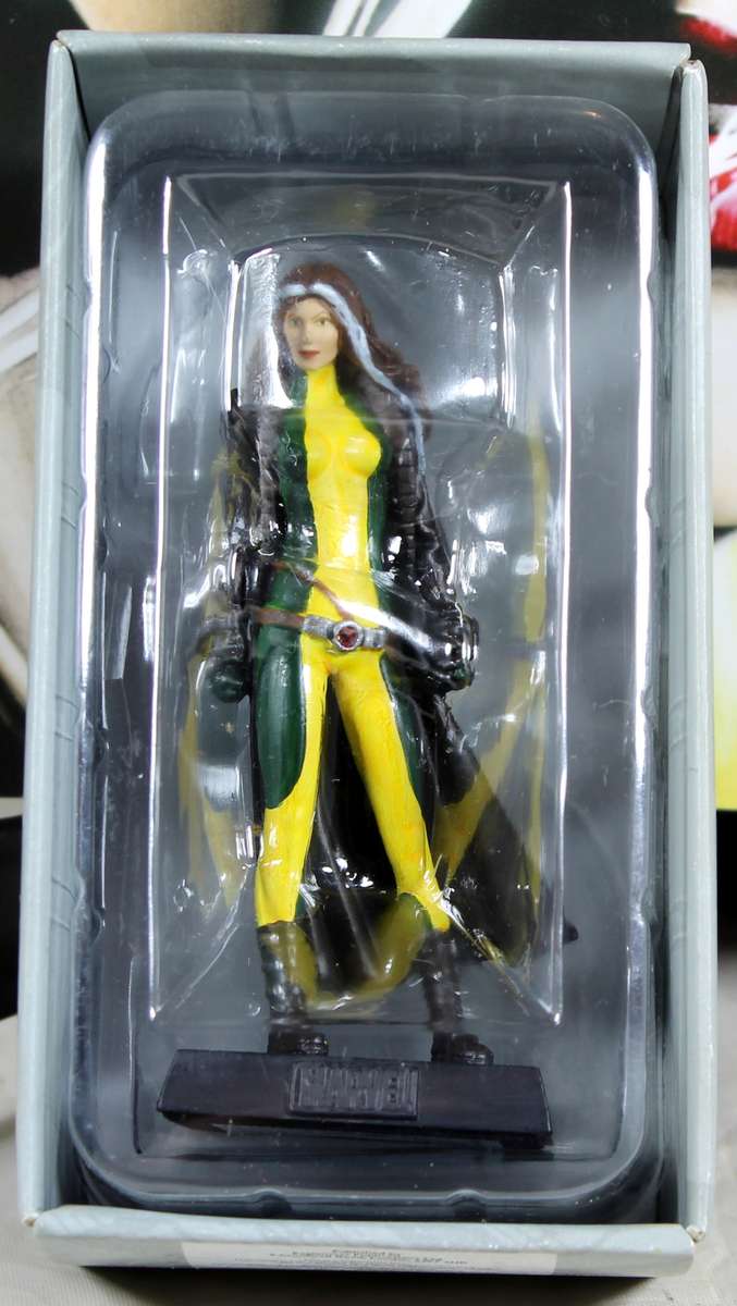 Marvel comics - lead, hand painted figurine with book - Rogue #29
