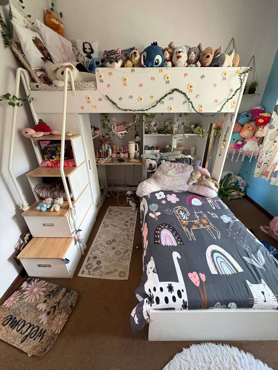 Kids bunk bed with built-in cupboard, drawers and table