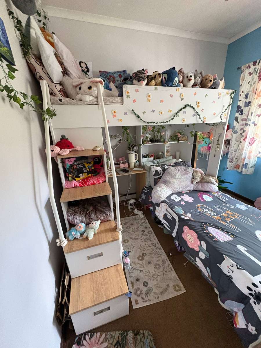 Kids bunk bed with built-in cupboard, drawers and table