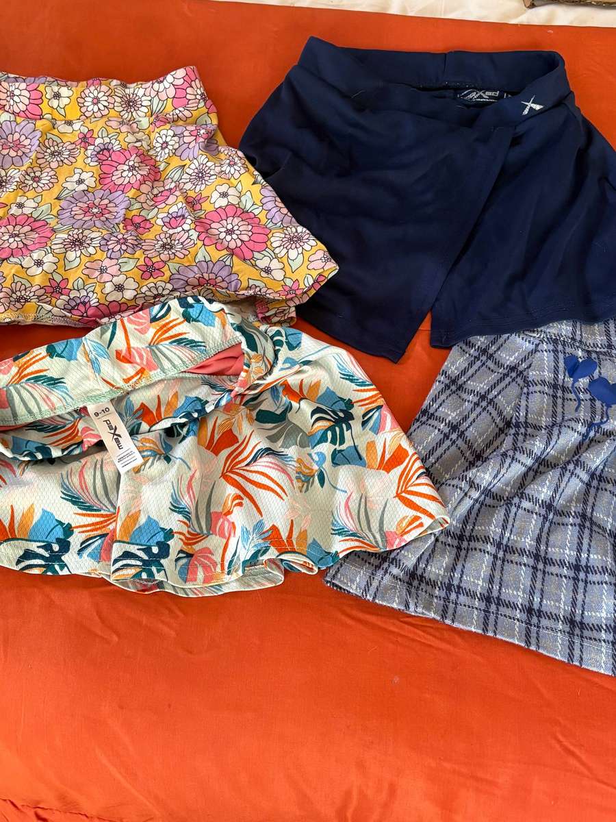 4 x girls skirts/skorts for age 9